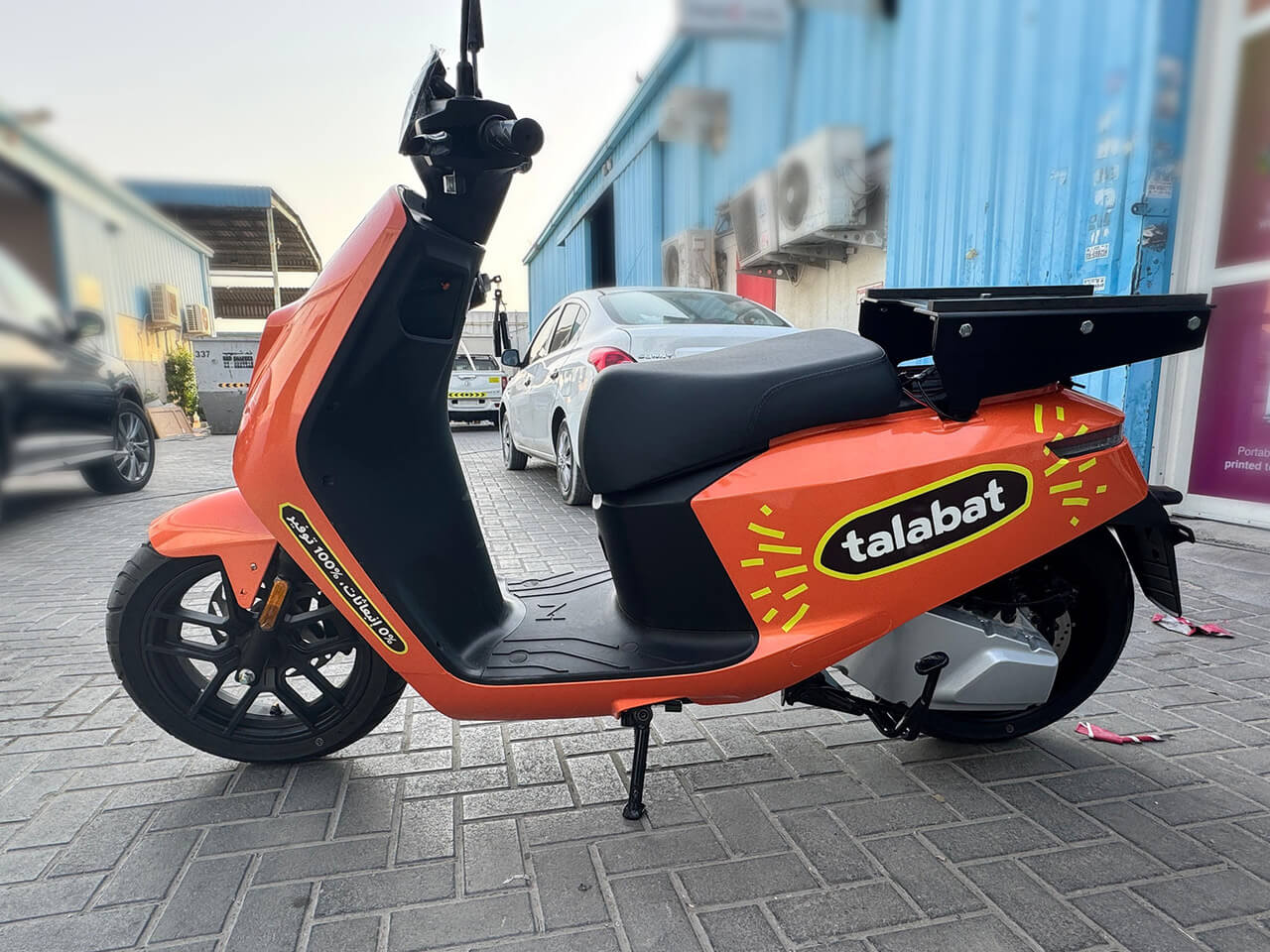 Talabat scooter with custom wrap