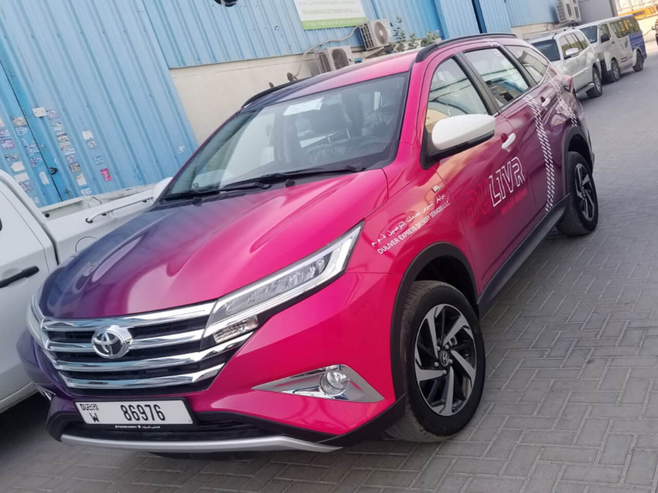 Toyota SUV with pink gradient wrap